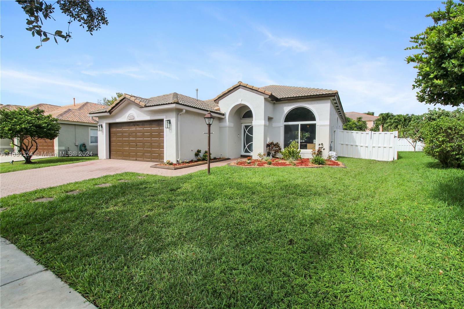 Property Photo:  14265 NW 18th Pl  FL 33028 