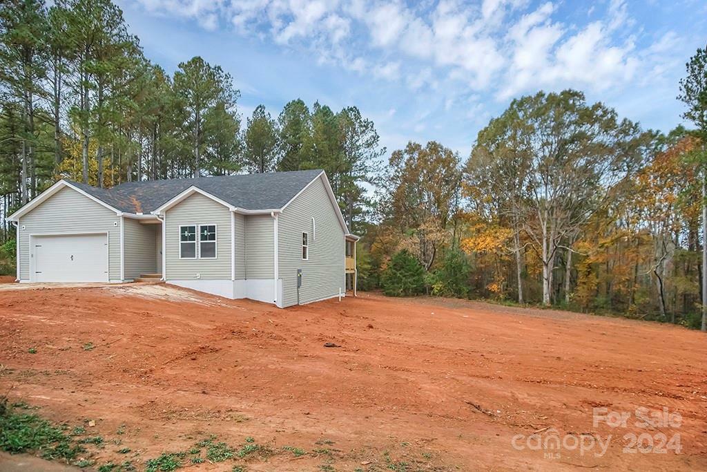 Property Photo:  7066 Sparrow Lane  NC 28168 