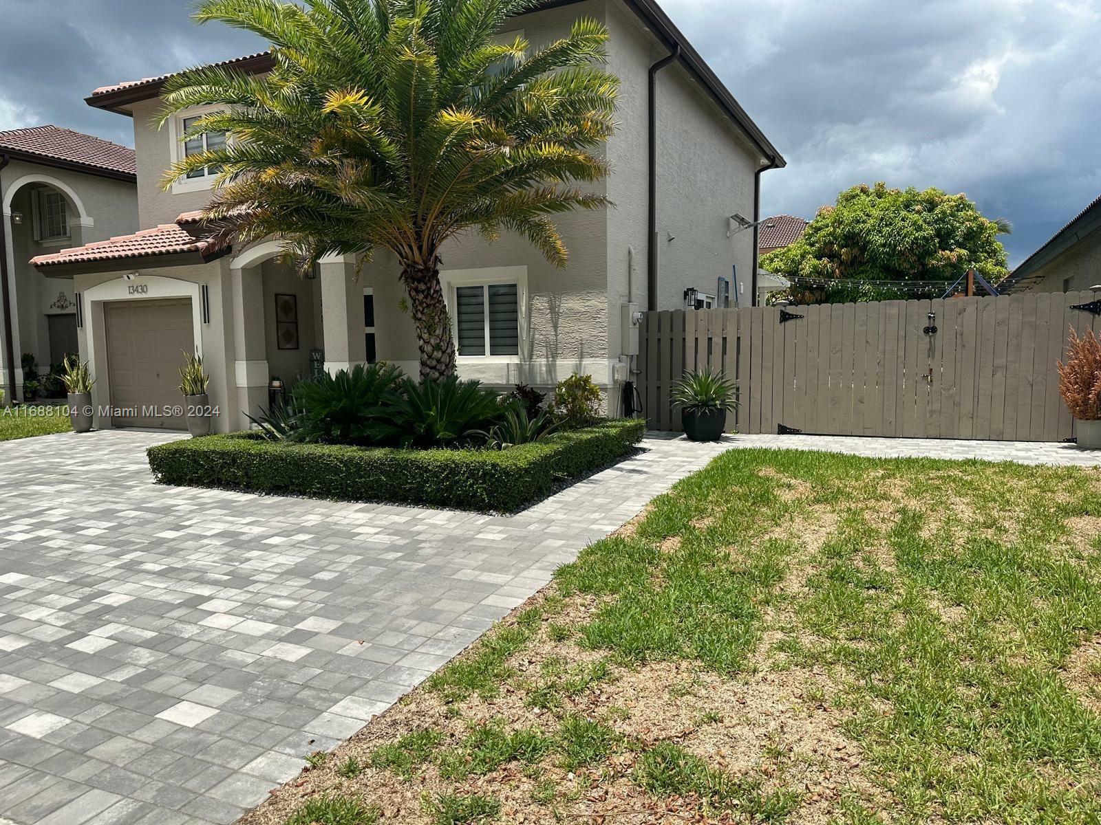 Property Photo:  13430 SW 118th Pl  FL 33186 