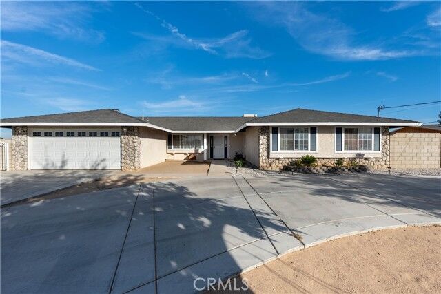 Property Photo: 11043 Locust Avenue CA 92345