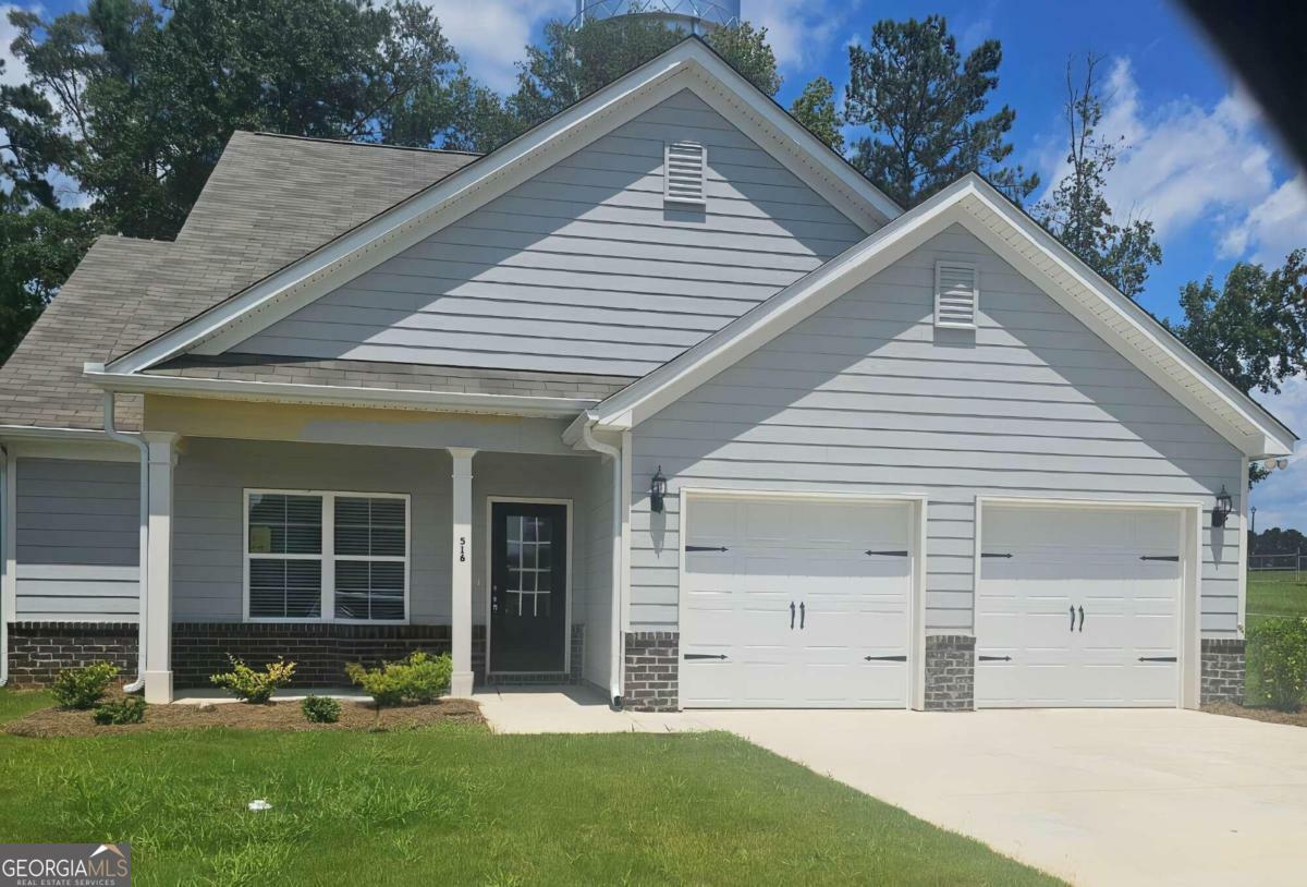 Property Photo:  516 Grand Magnolia Street  GA 30233 