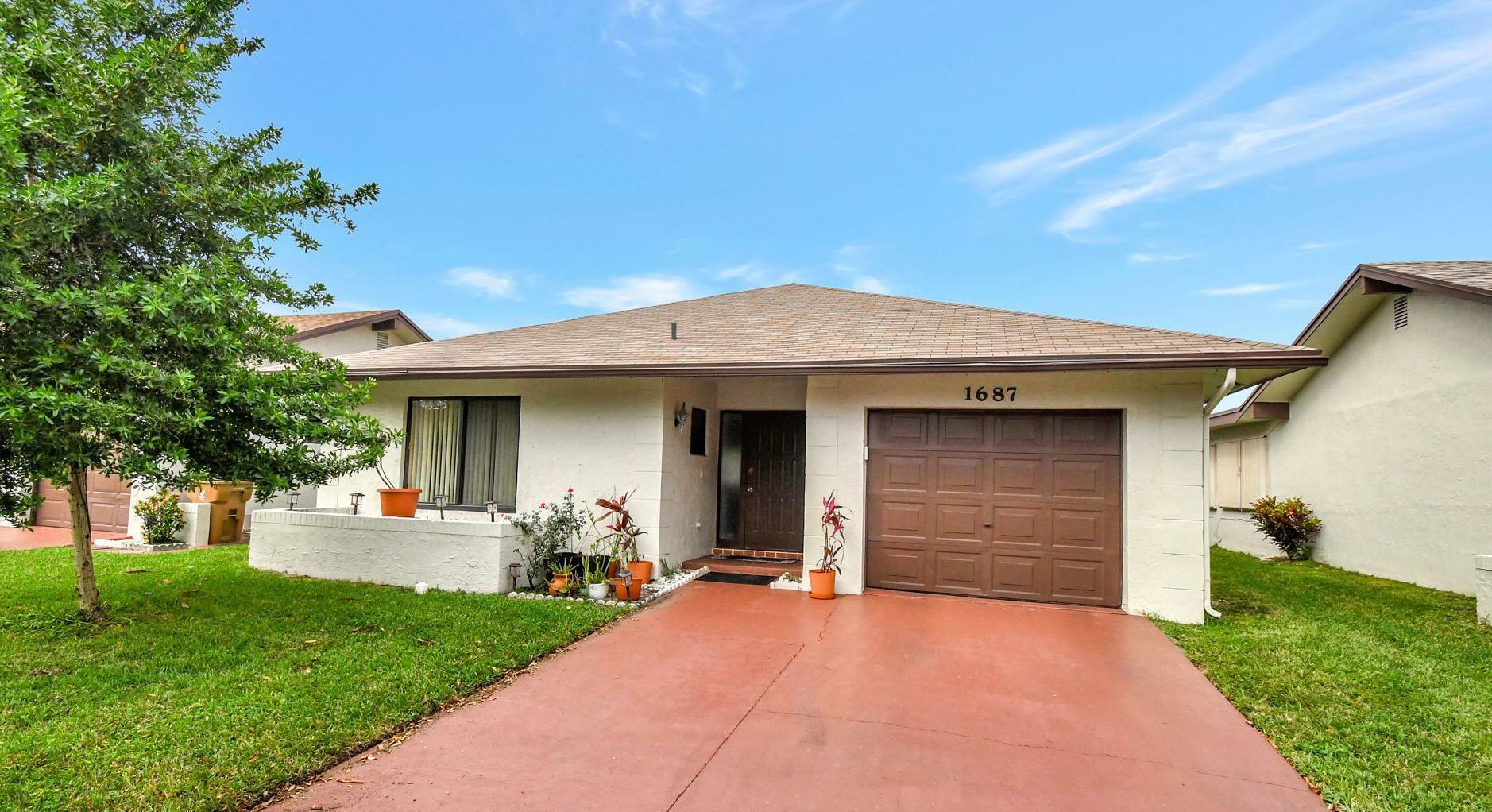 Property Photo:  1687 SW 20th Terrace  FL 33442 