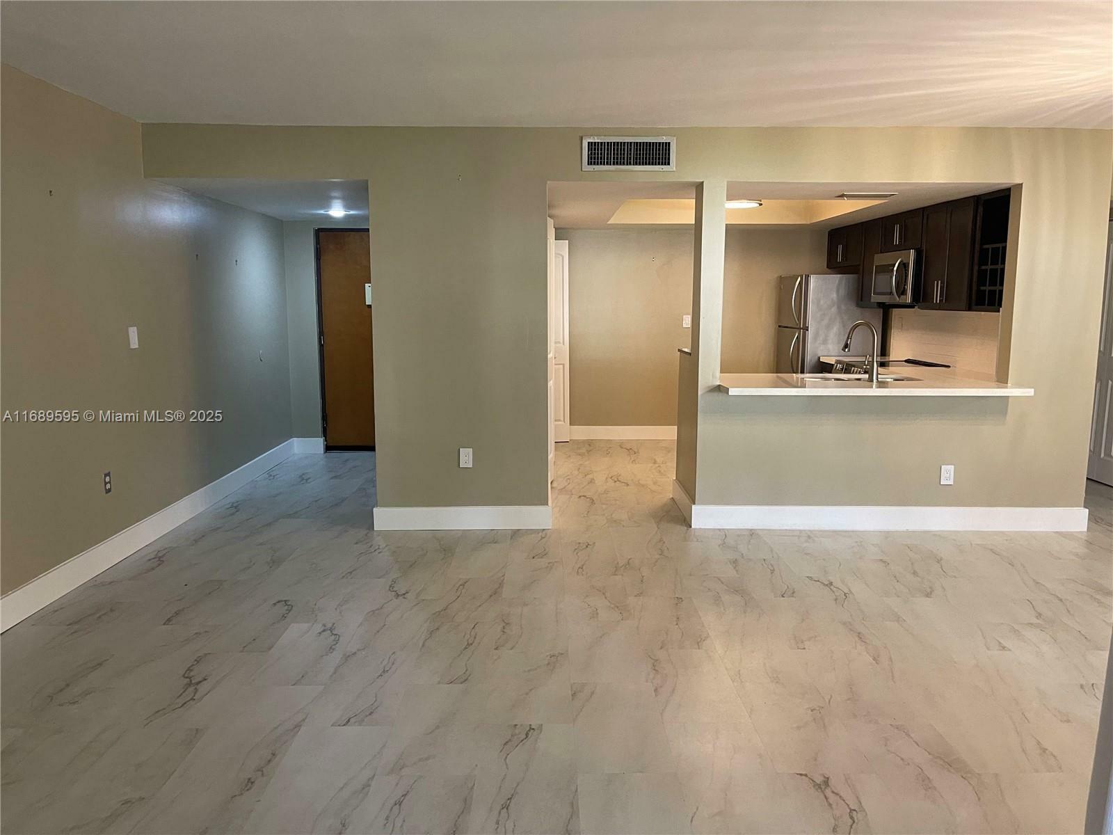 Property Photo:  8810 SW 123rd Ct M205  FL 33186 