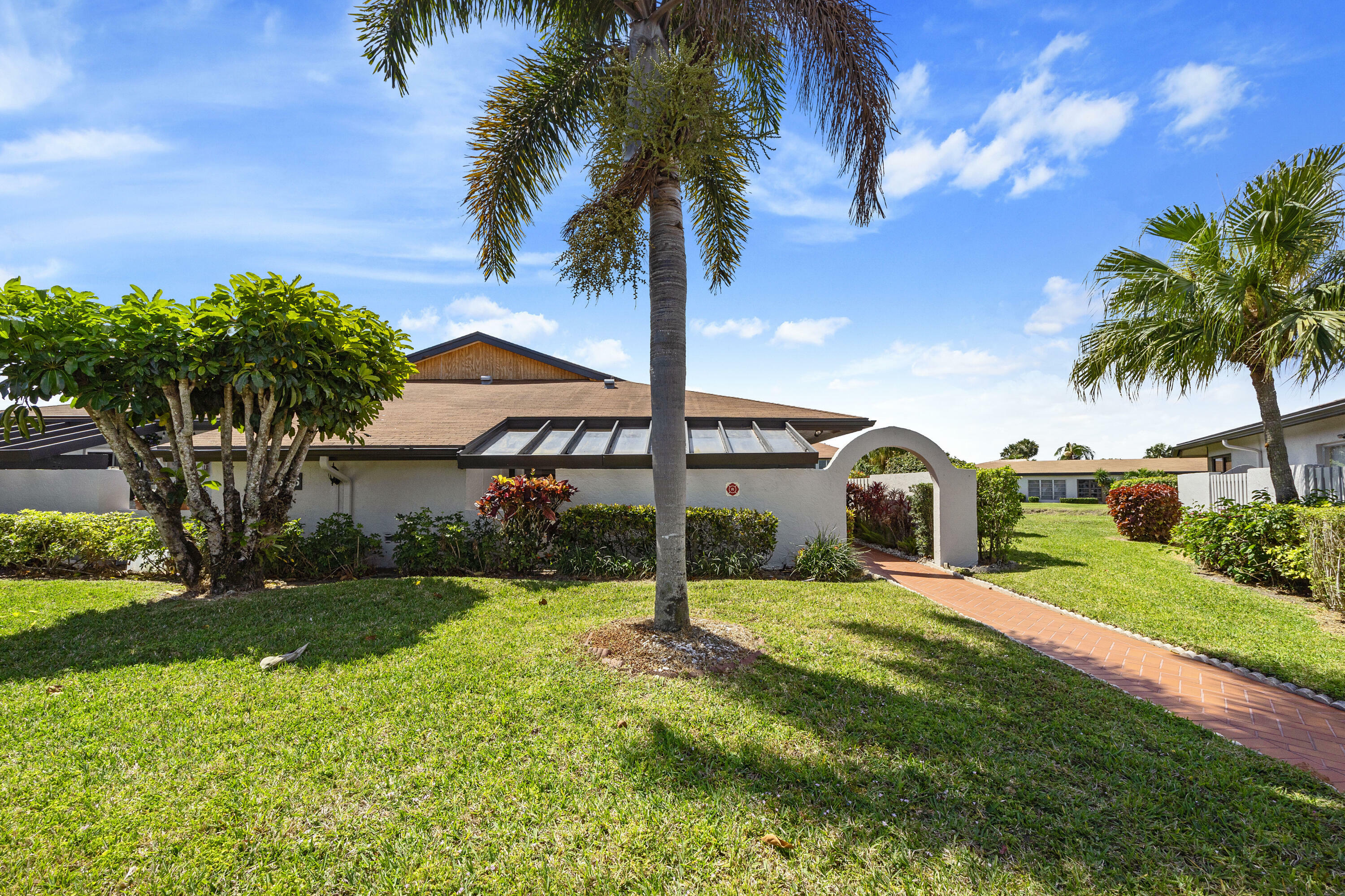 Property Photo:  13616 Coconut Palm Court B  FL 33484 