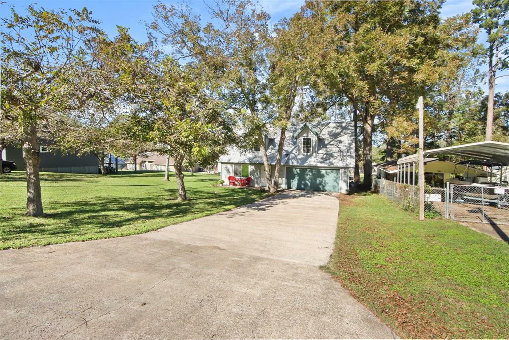 Property Photo:  70 Rustling Oaks Street  TX 77331 