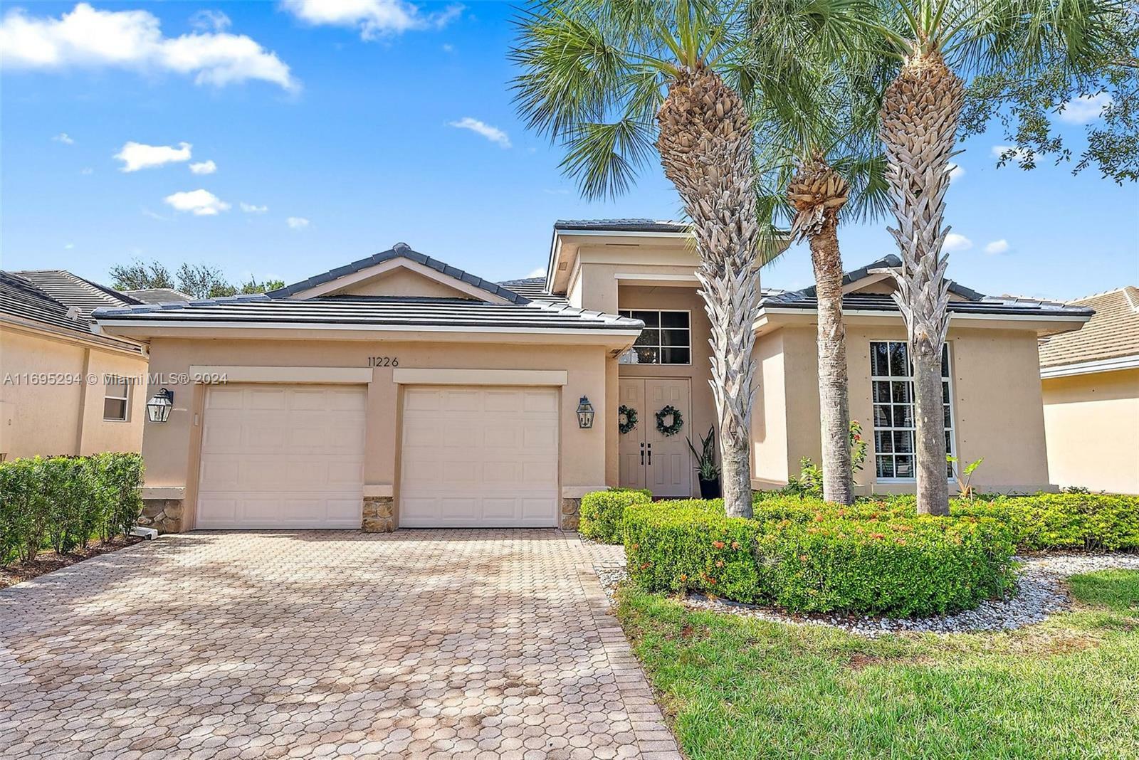 Property Photo:  11226 Osprey Lake Ln  FL 33412 