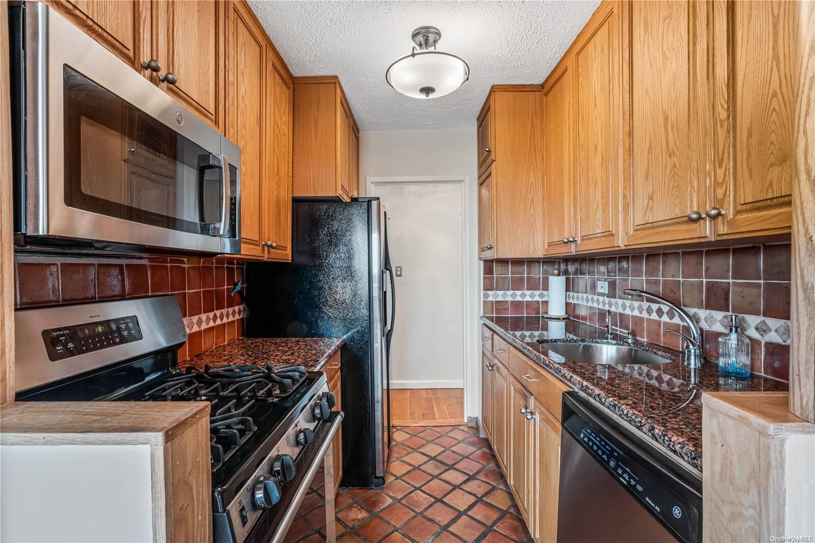 Property Photo: 17-85 215 Street 9E NY 11360