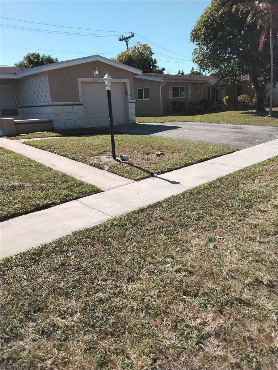 Property Photo:  3572 NW 35th St  FL 33309 