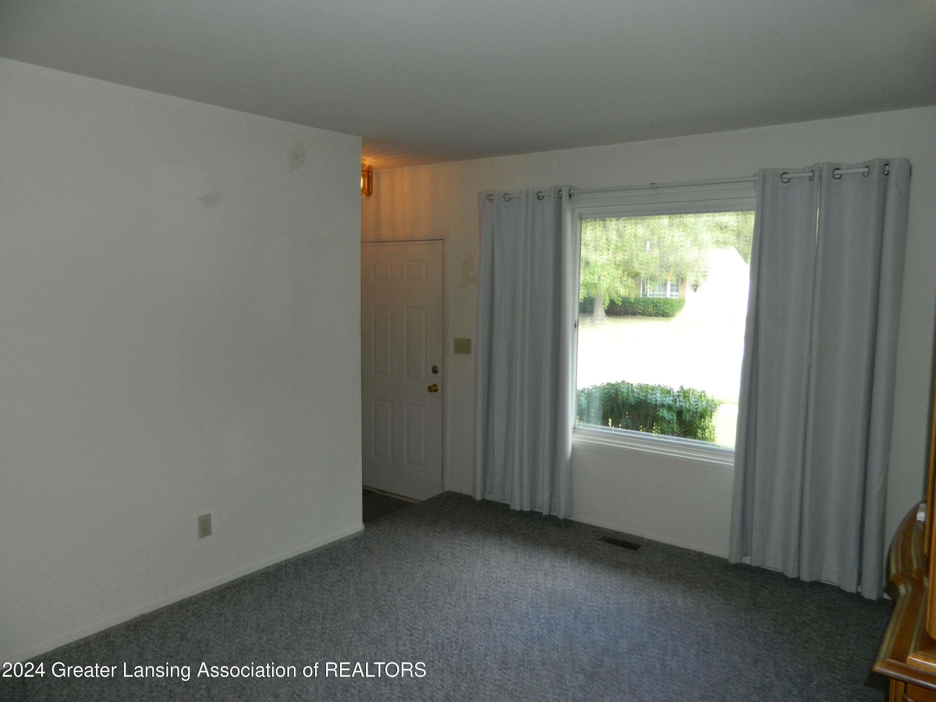 Property Photo:  1901 Cromwell Street  MI 48842 