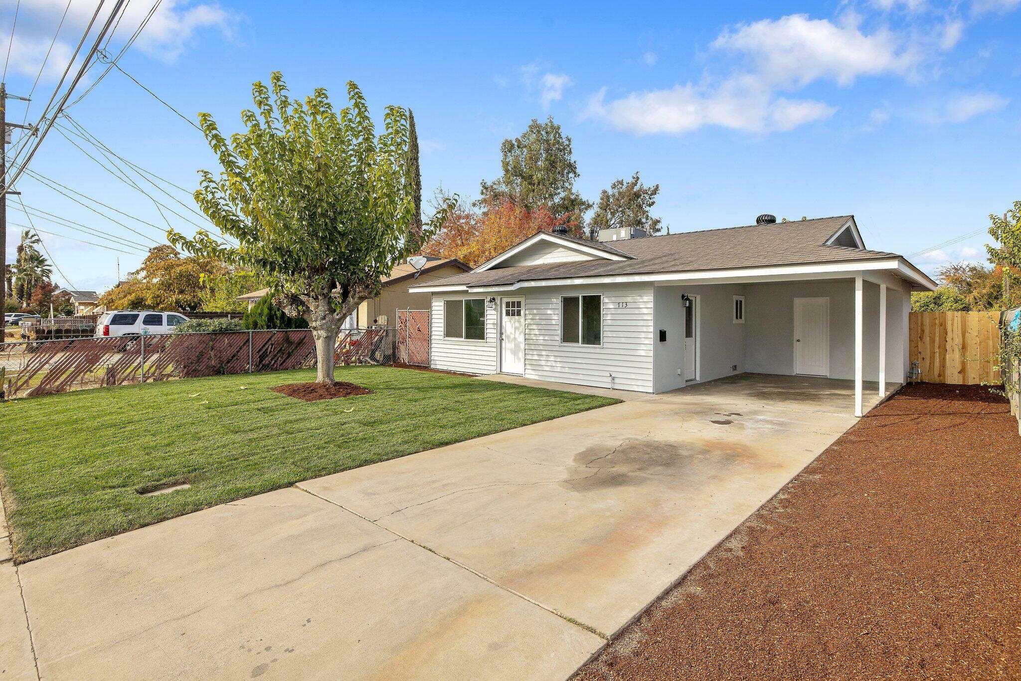 Property Photo:  713 W Firebaugh Avenue  CA 93221 