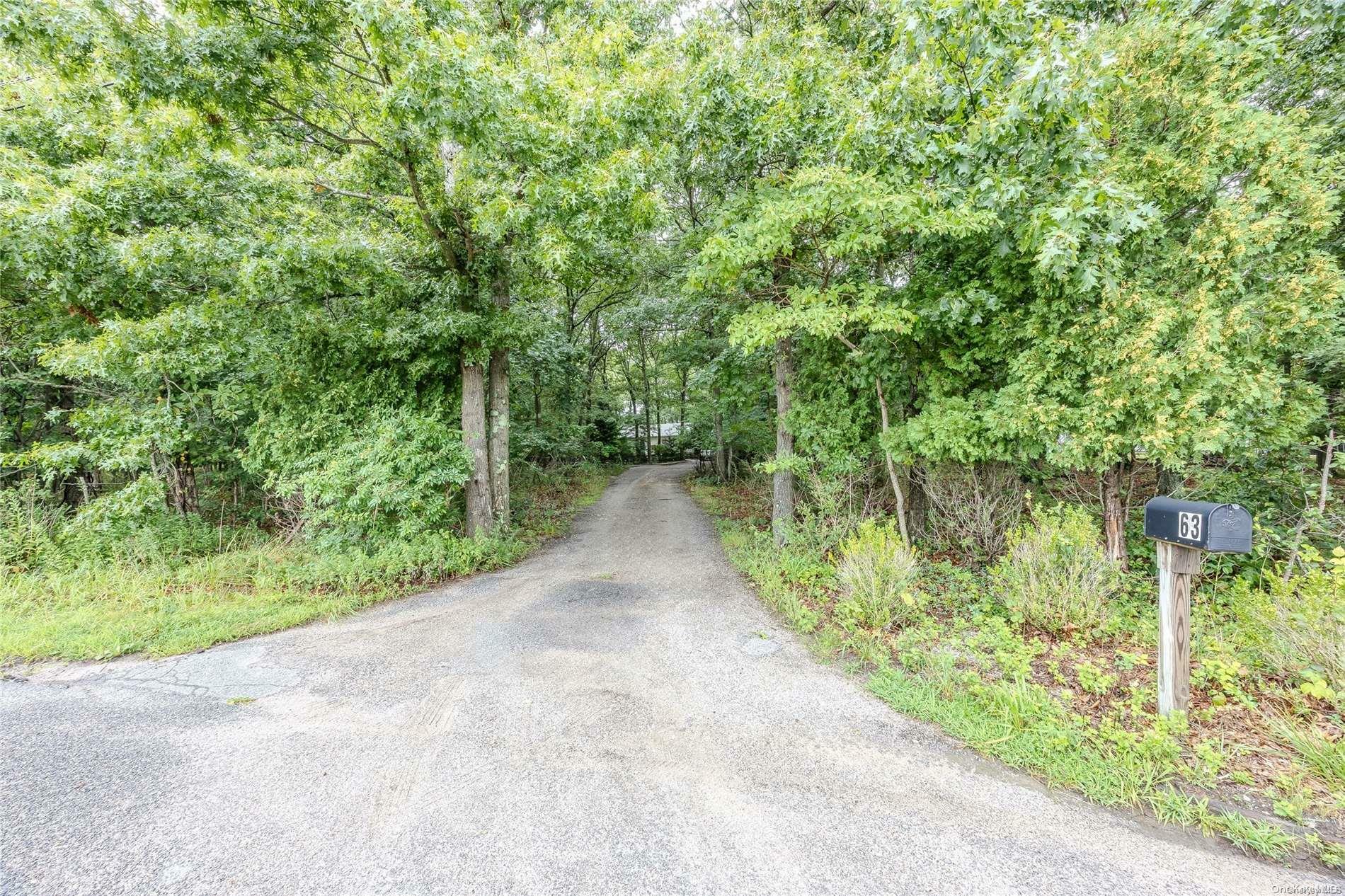 Property Photo:  63 Whiskey Road  NY 11727 