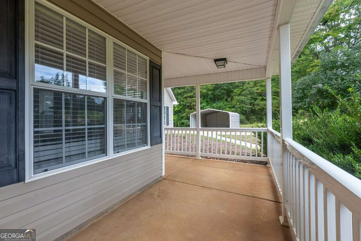 Property Photo:  5613 Highway 81 E  GA 30252 