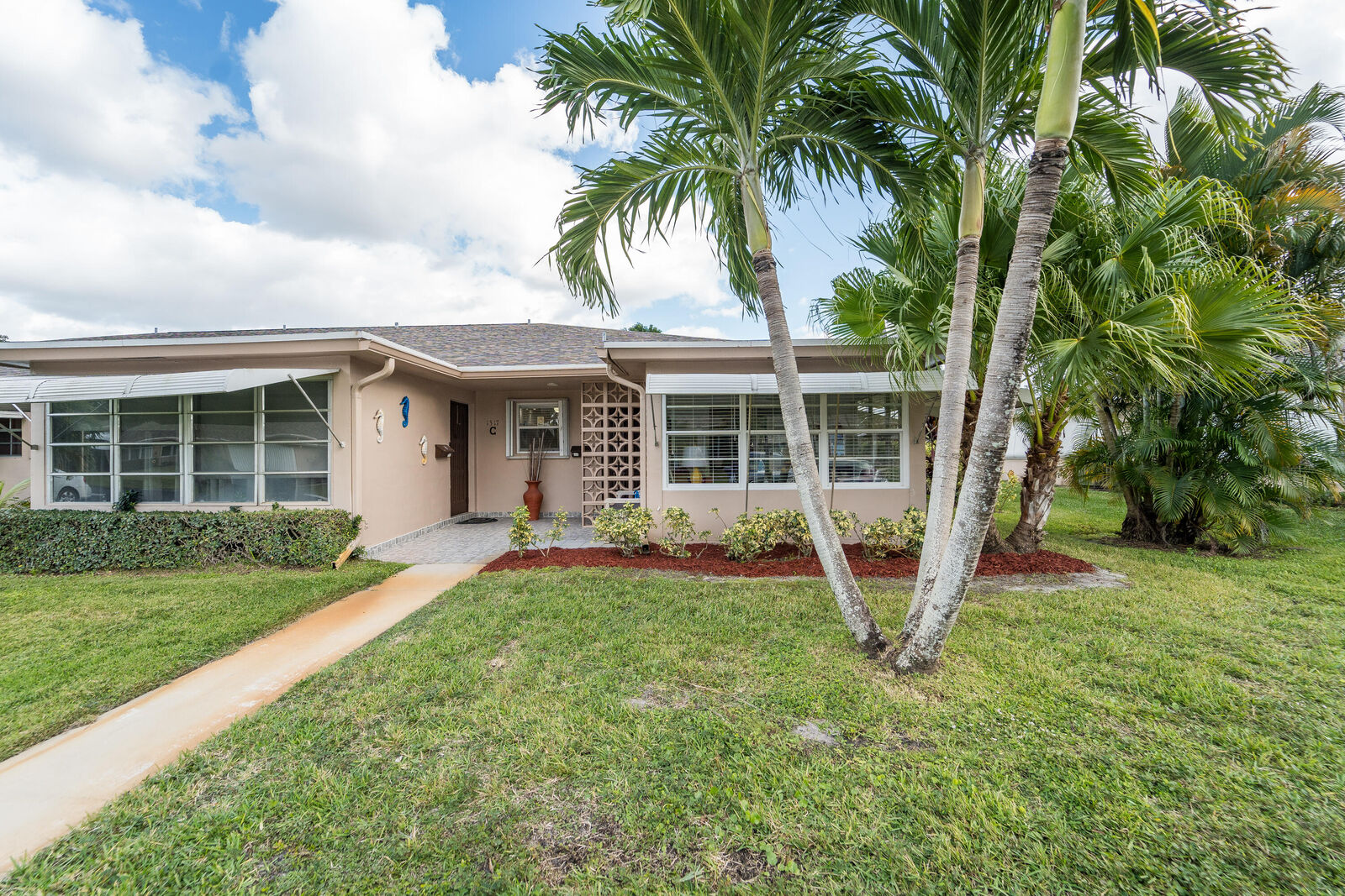 Property Photo:  1317 High Point Way SE D  FL 33445 