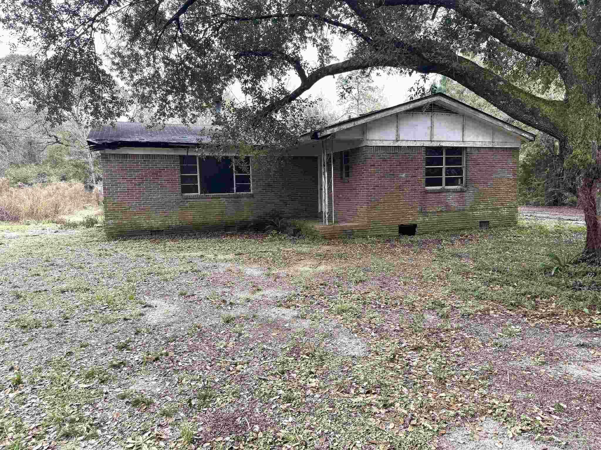 Property Photo:  9985 Paws Rd  FL 32570 