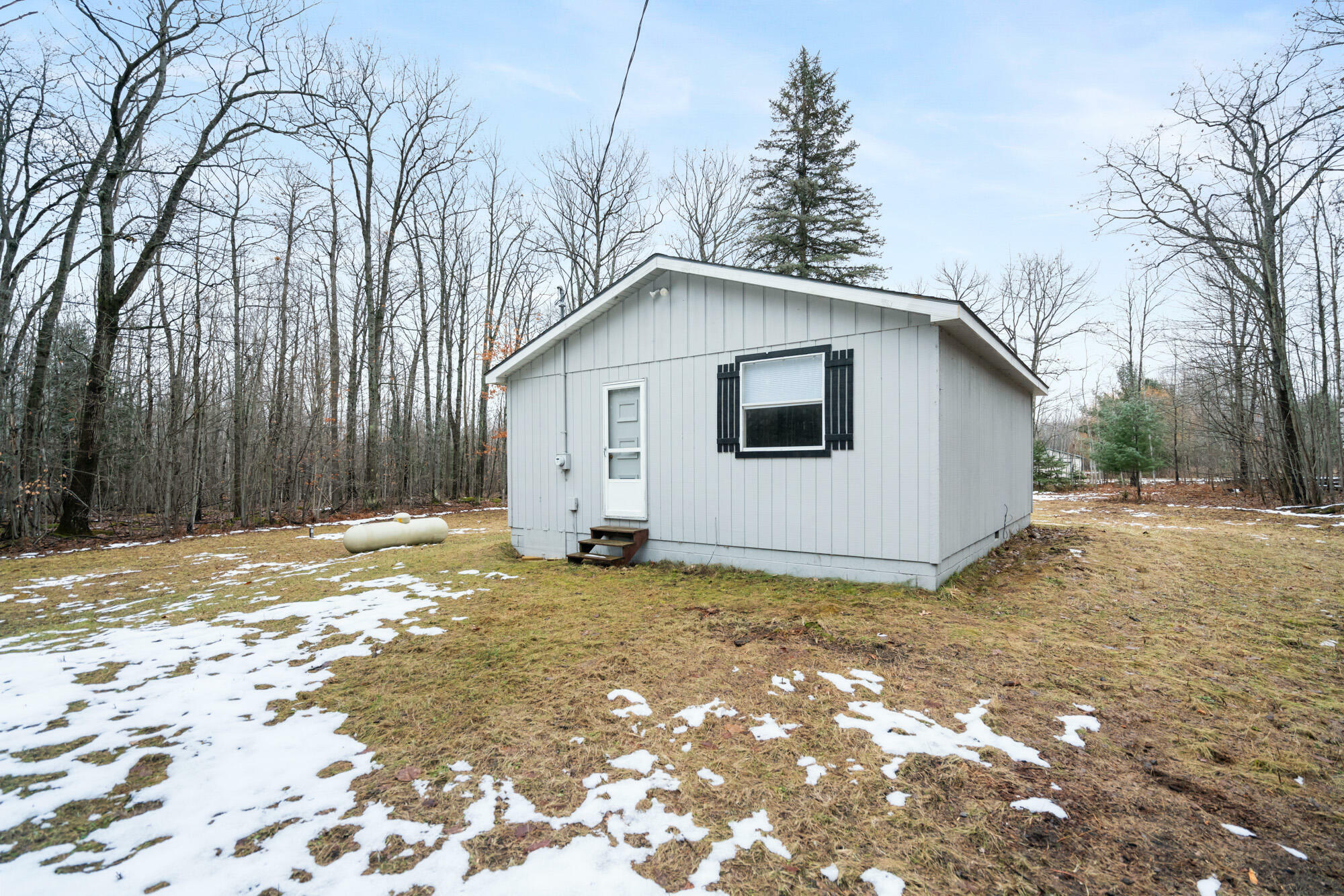 Property Photo:  4280 Woodmansee Road  MI 49721 