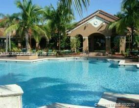 Property Photo:  4580 NW 107th Ave 207-13  FL 33178 