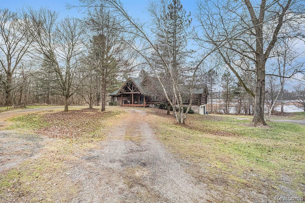 Property Photo:  121 Davis Lake Road  MI 48446 1468 