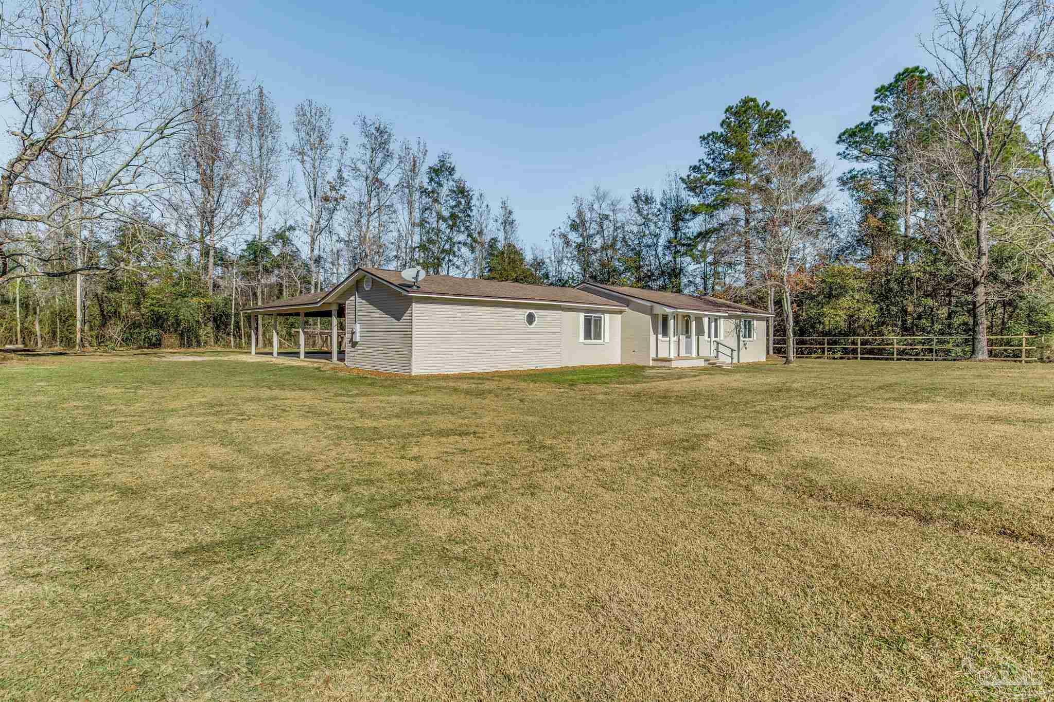 Property Photo:  6750 Camp Henderson Rd  FL 32565 