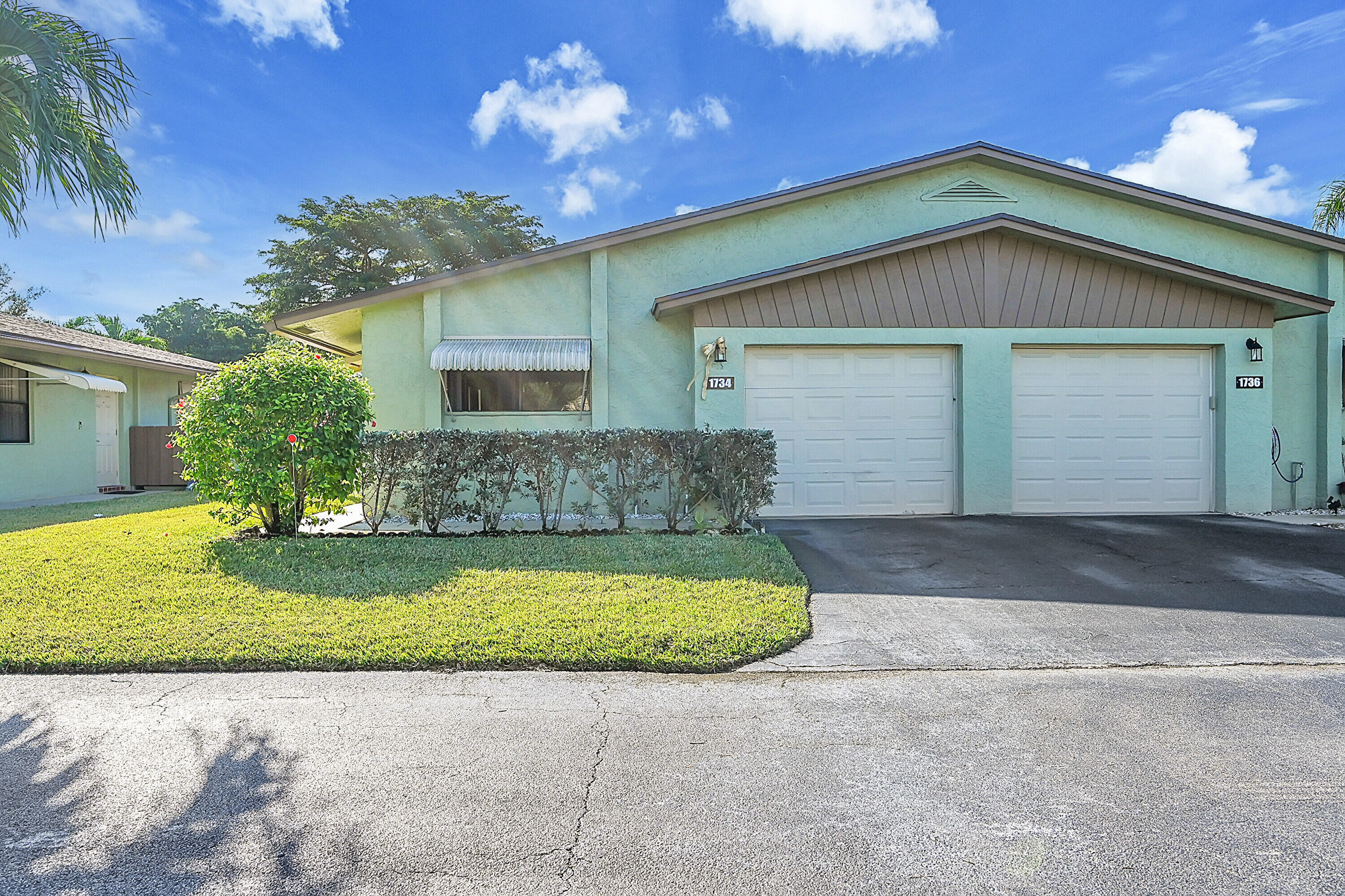 Property Photo: 1734 Palmland Drive FL 33436