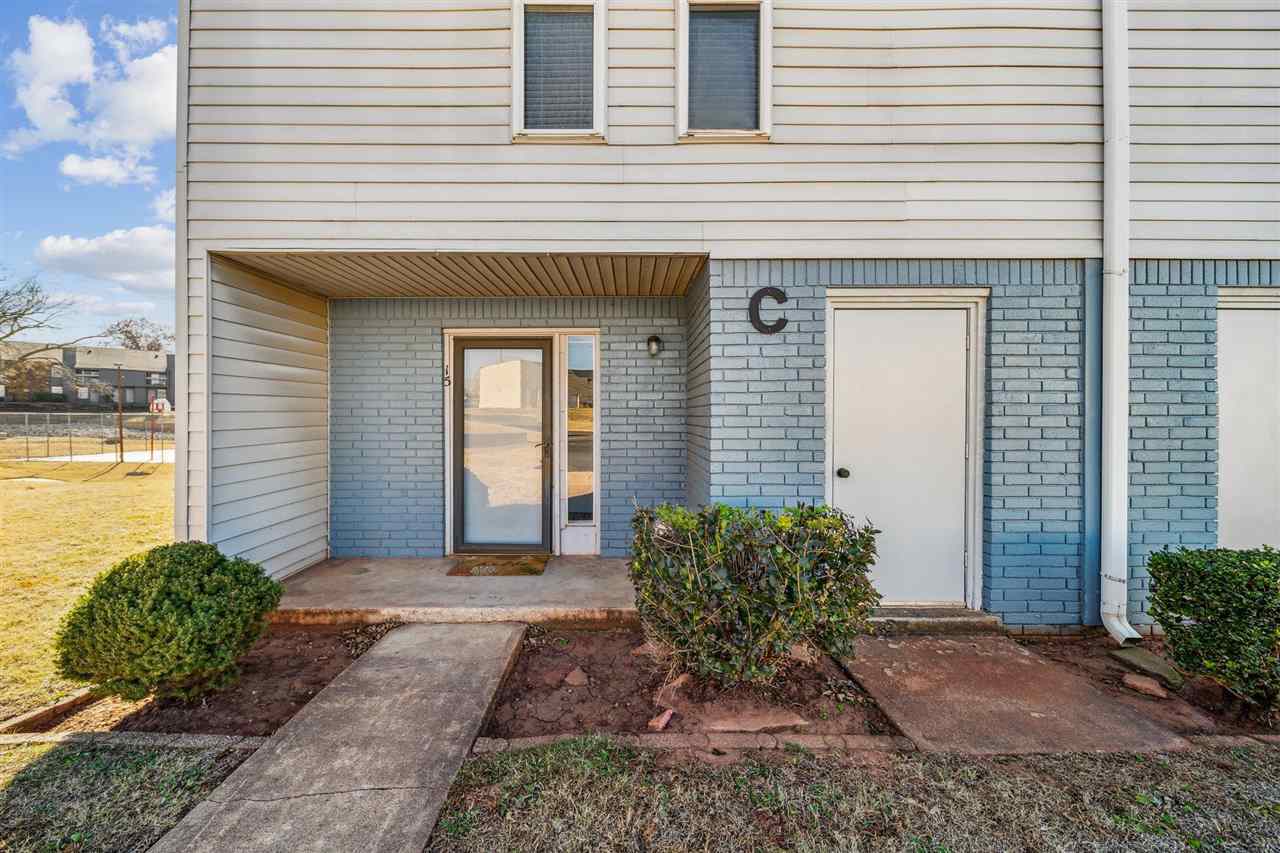 Property Photo: 1400 S Perkins Road Unit C-15 OK 74075