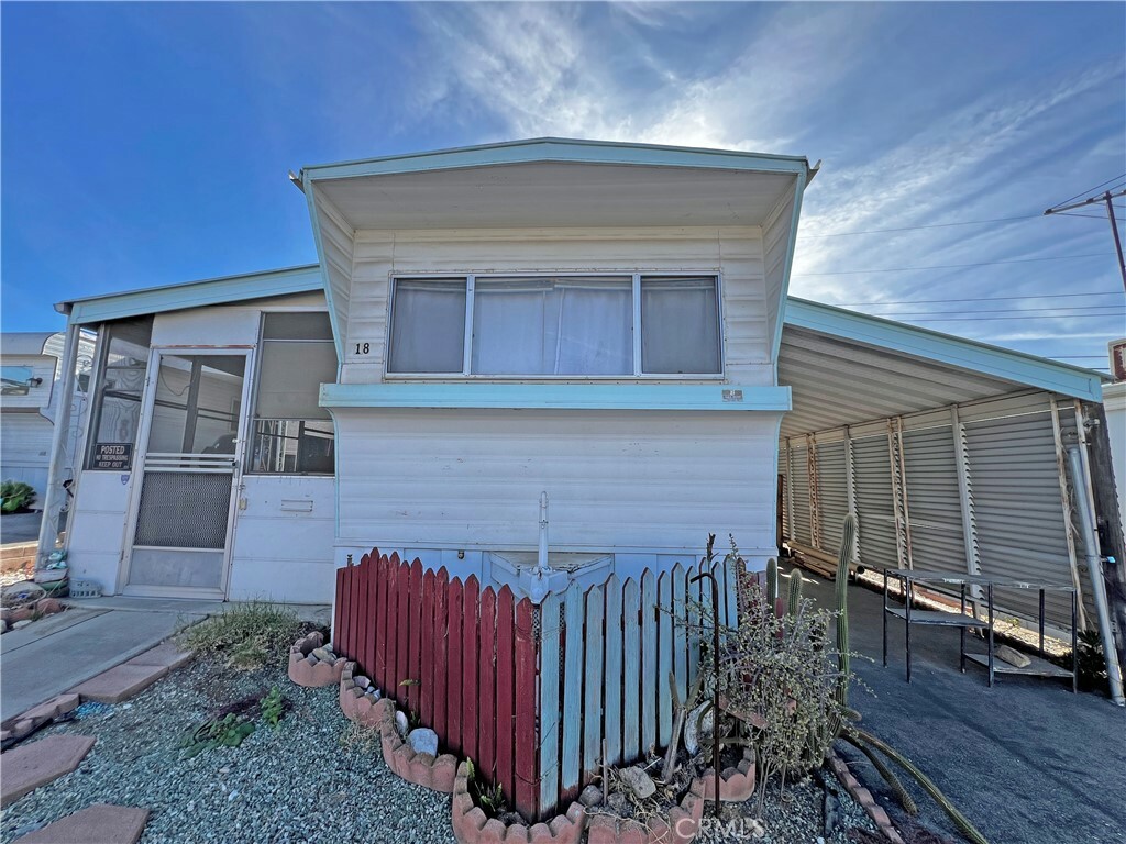 Property Photo:  12177 3rd 18  CA 92399 