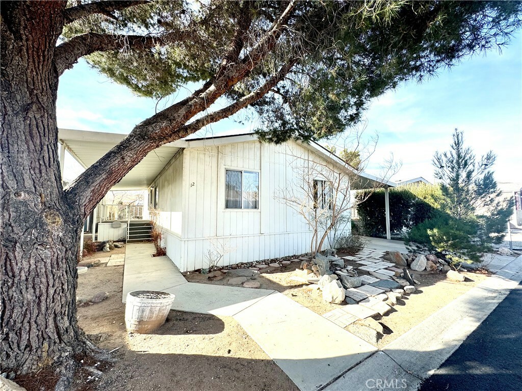 Property Photo:  20843 Waalew Rd 12  CA 92307 