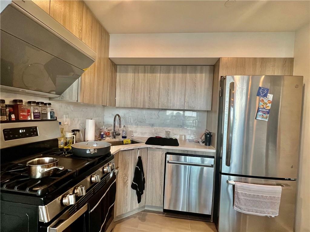 Property Photo:  32-58 105th Street 5C  NY 11369 