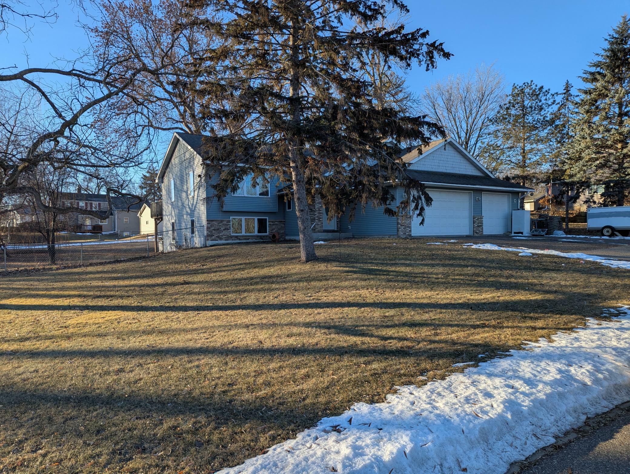 Property Photo:  203 Maple Avenue  MN 55390 