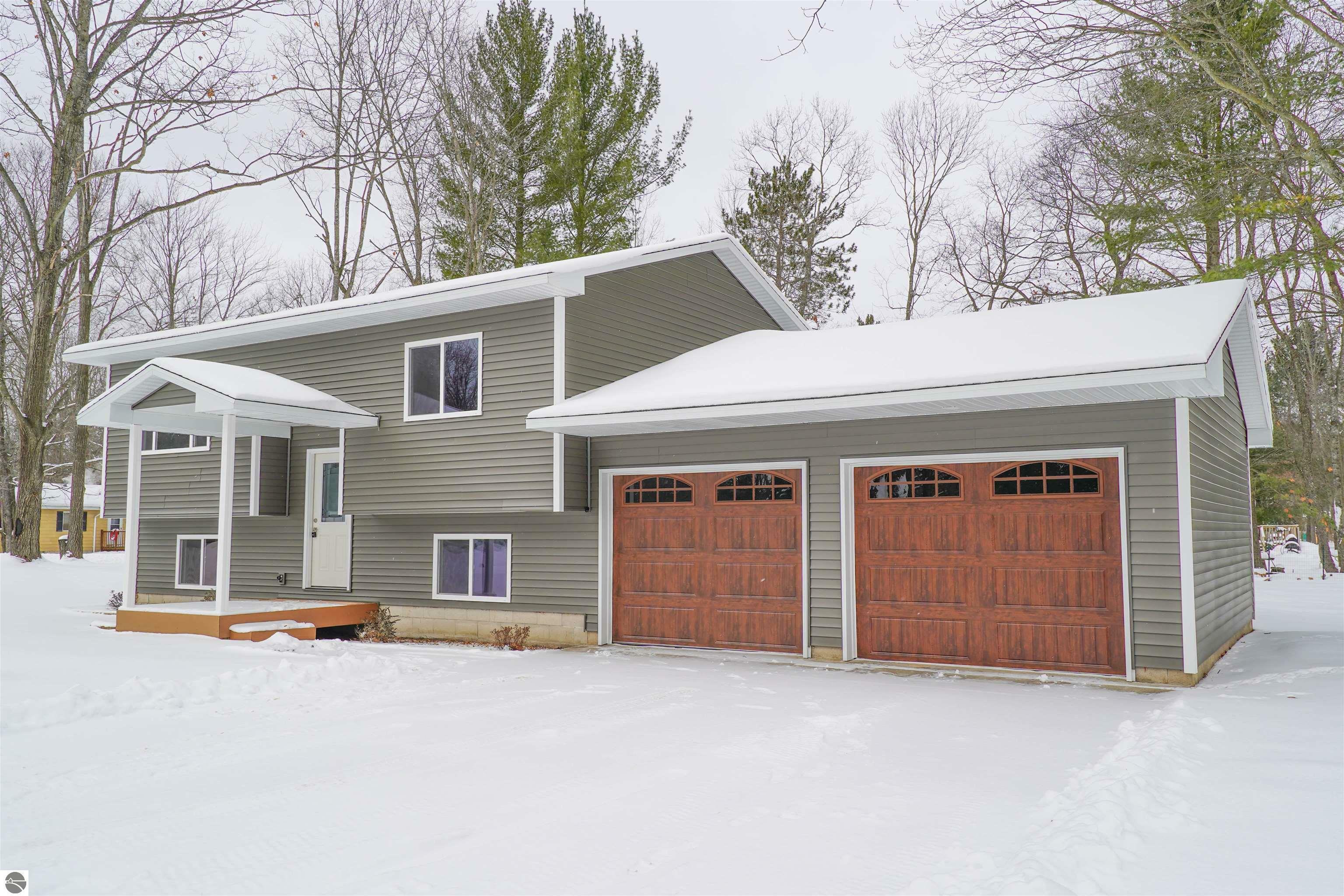 Property Photo:  819 Charlene Drive  MI 49646 