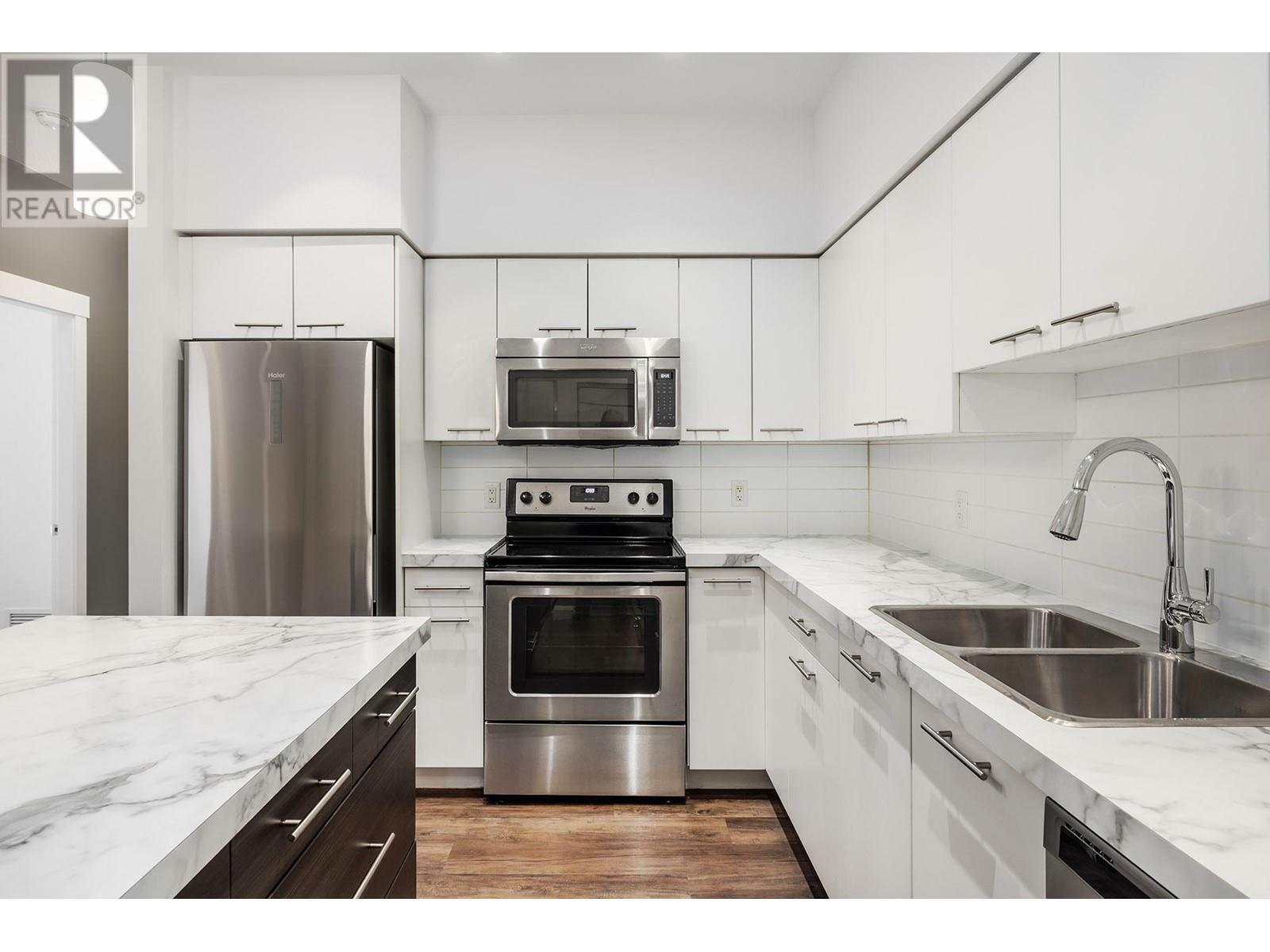 Property Photo: 975 Academy Way 214 BC V1V 3C8