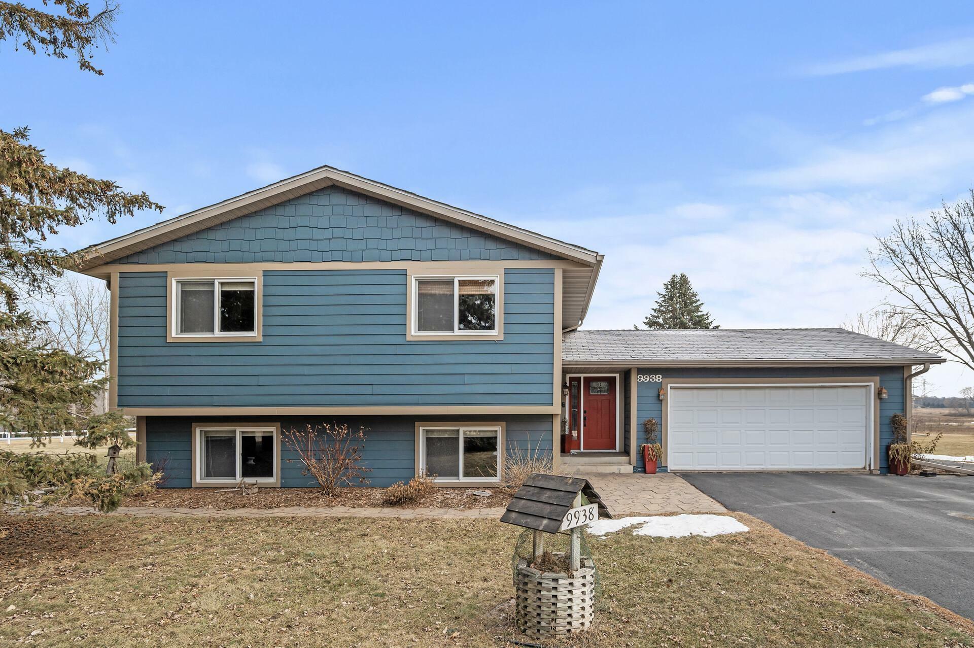 Property Photo:  9938 Rich Valley Boulevard  MN 55077 