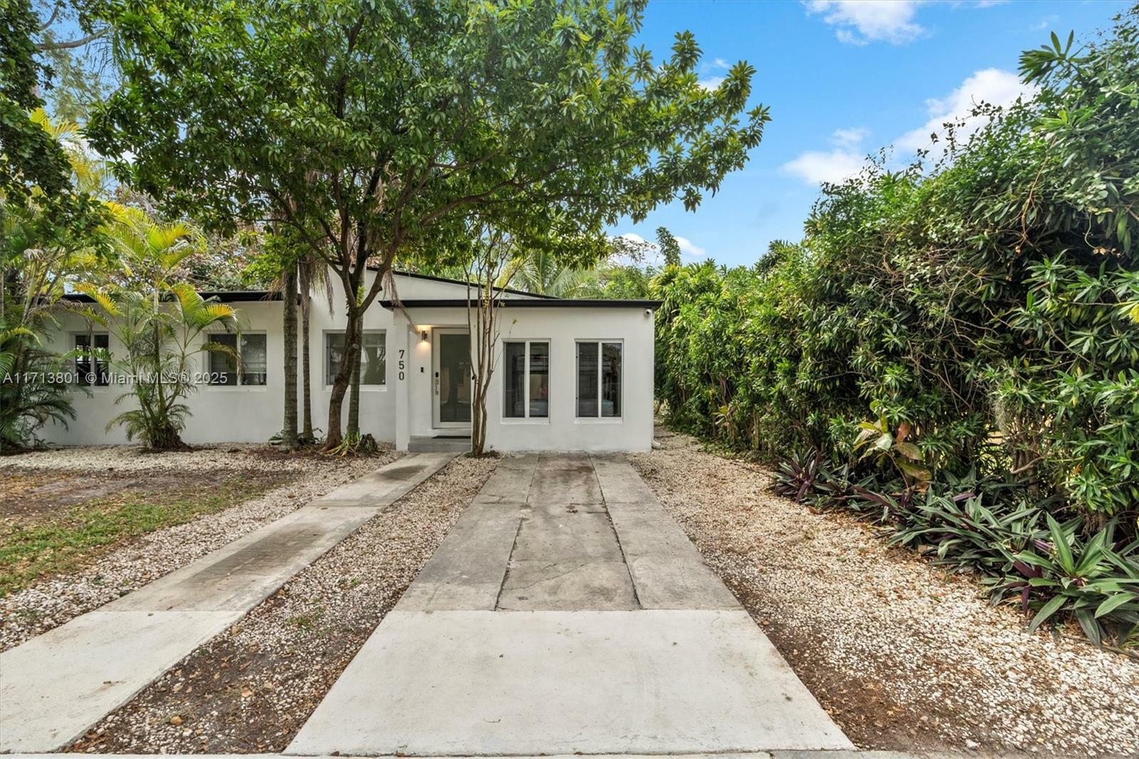 Property Photo:  750 NW 83rd Ter  FL 33150 