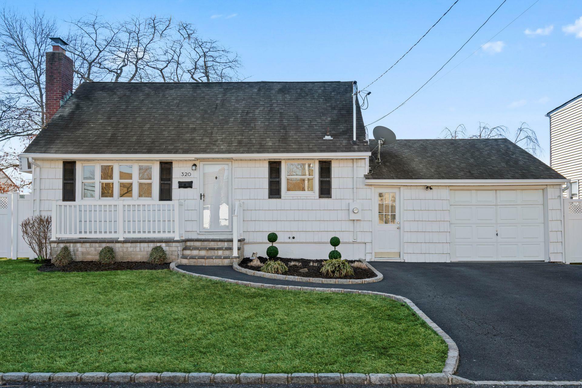 Property Photo:  320 Kurzon Road  NY 11795 