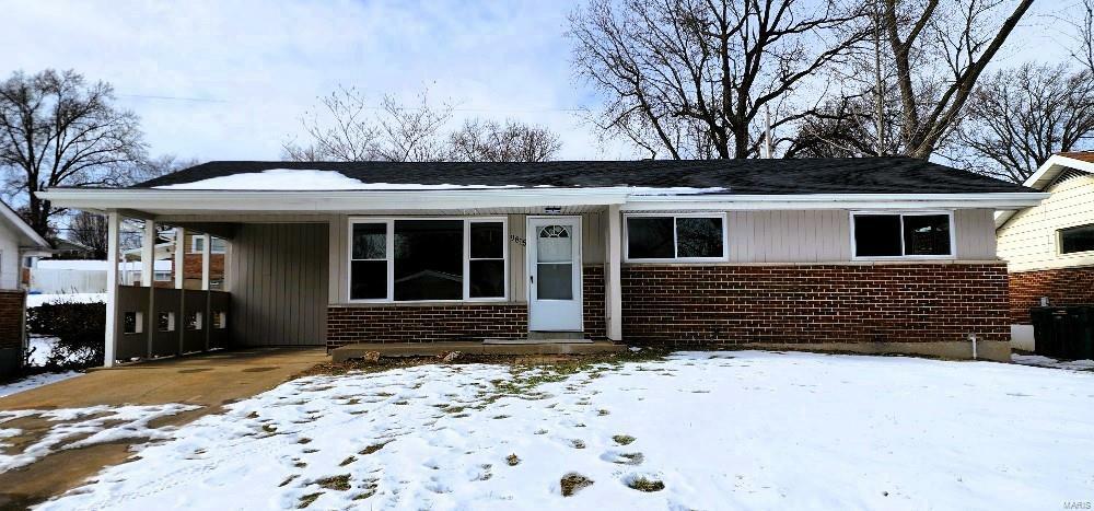 Property Photo:  9815 Portage Drive  MO 63136 