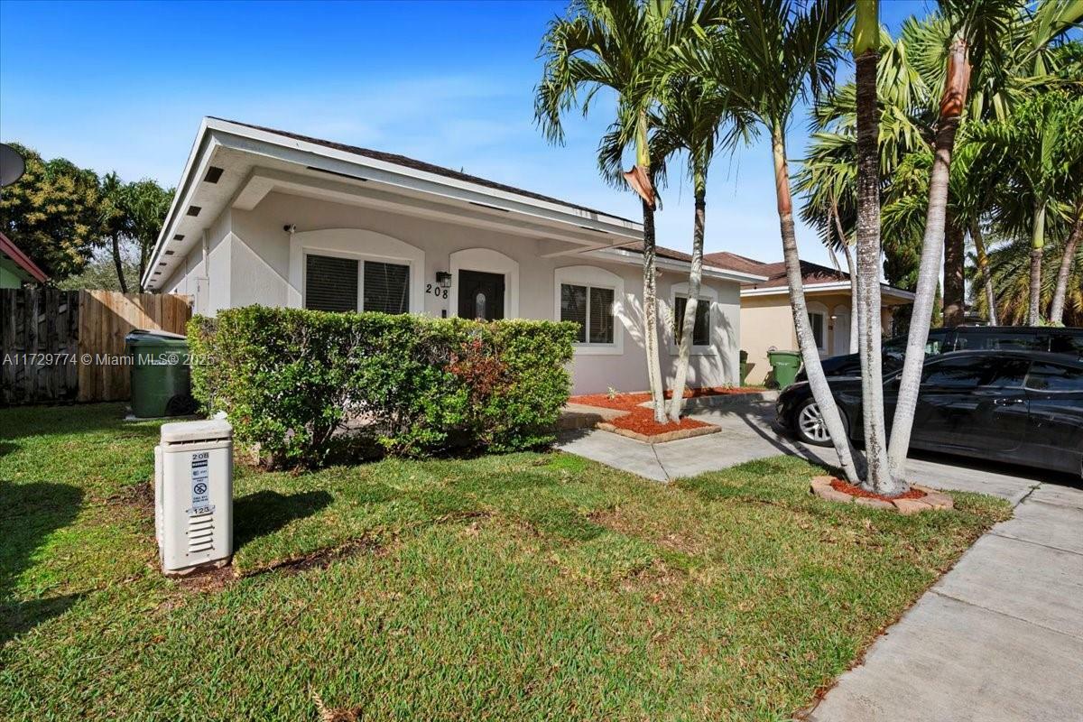 Property Photo:  208 SW 15th Ter  FL 33030 