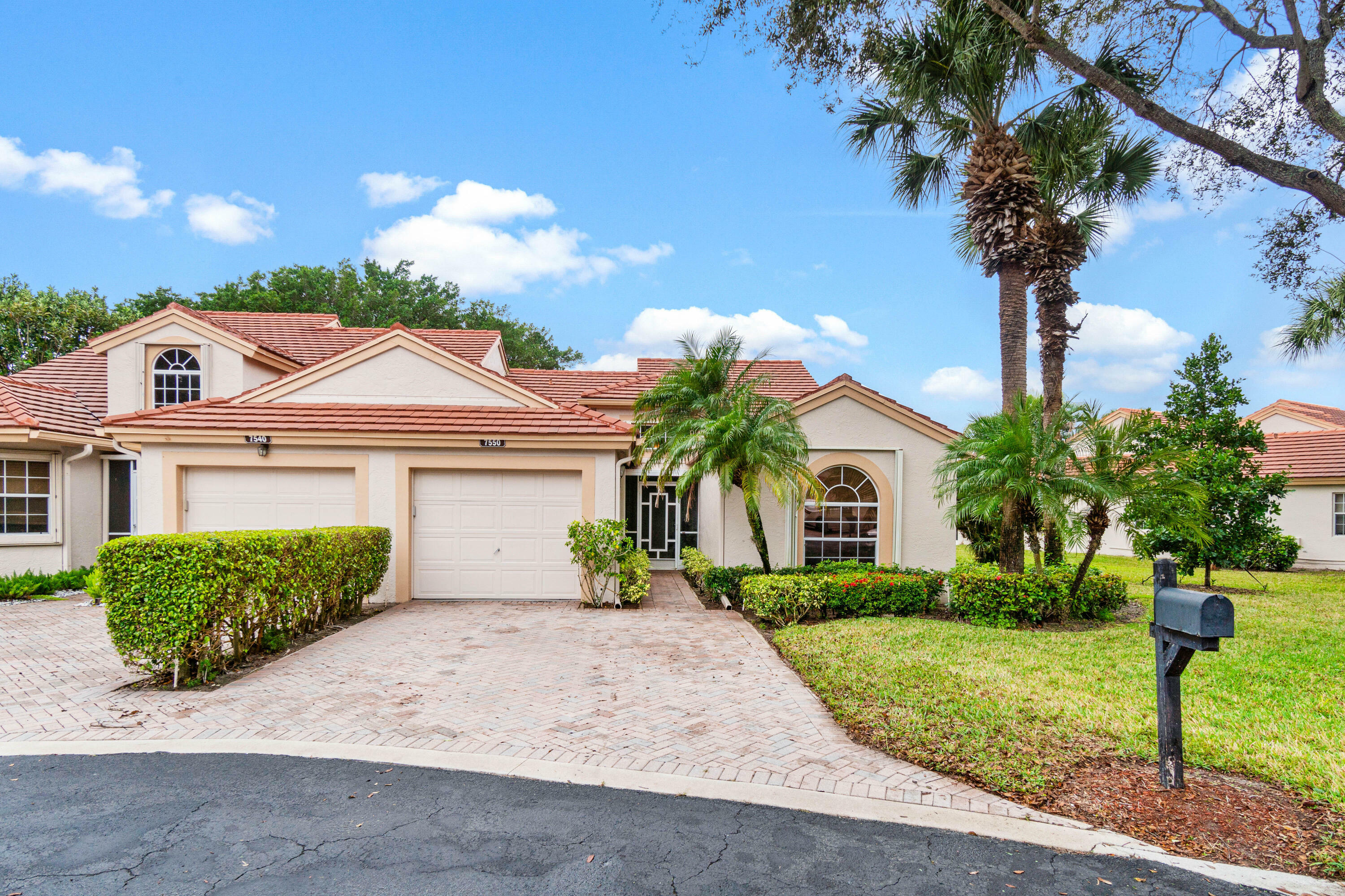 Property Photo:  7550 Diamond Pointe Circle  FL 33446 