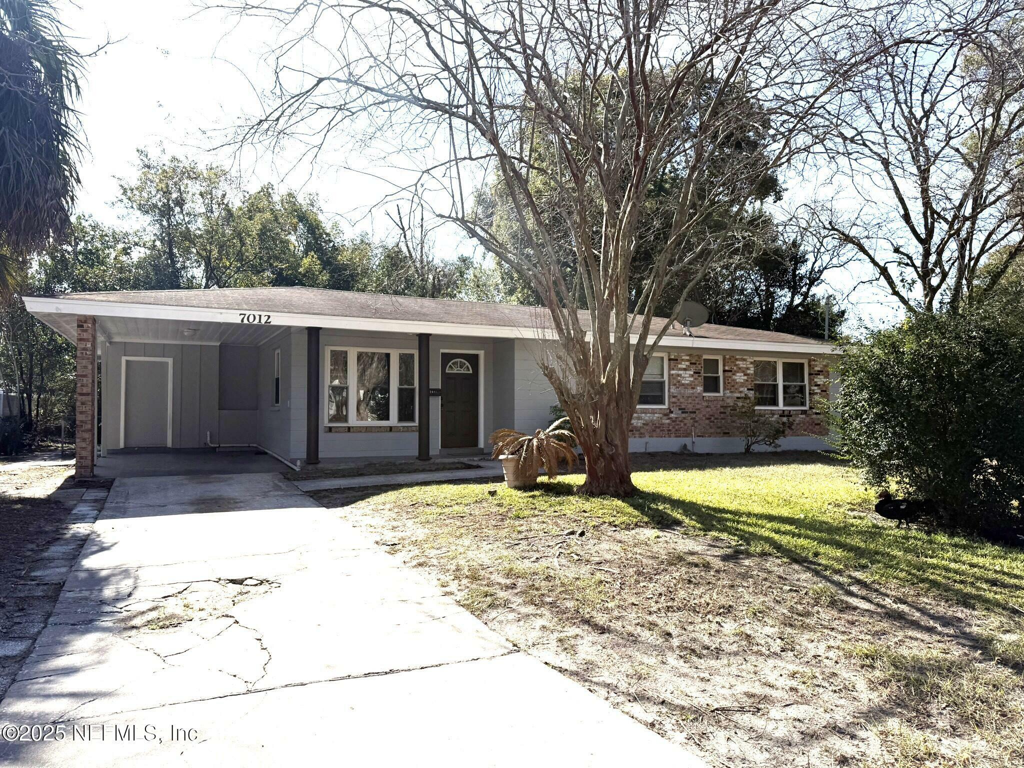 Property Photo:  7012 Biddy Lane  FL 32210 