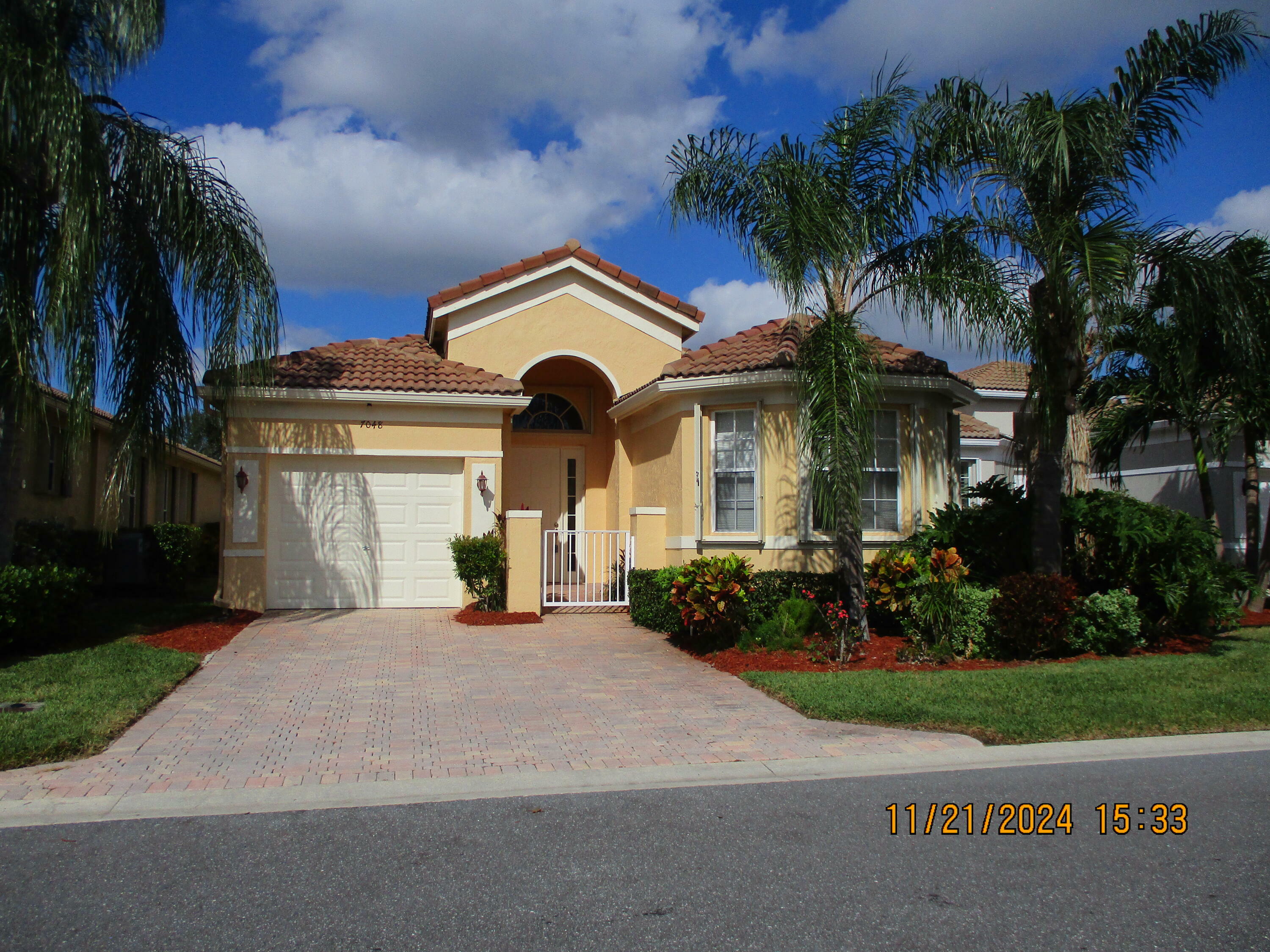 Property Photo:  7048 Cataluna Circle  FL 33446 