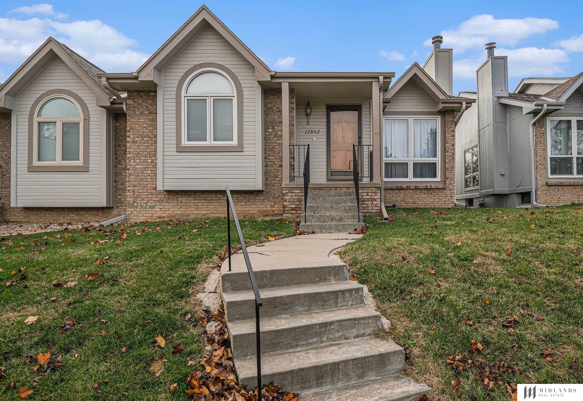 Property Photo:  12802 S 28 Avenue  NE 68123 