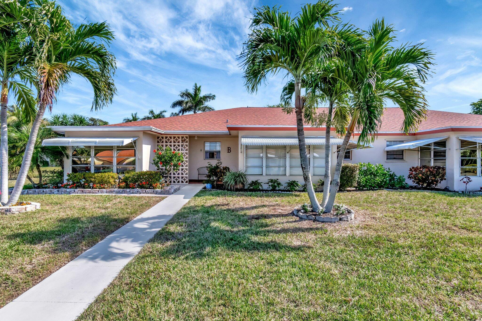 Property Photo:  235 NW 46th Avenue B  FL 33445 