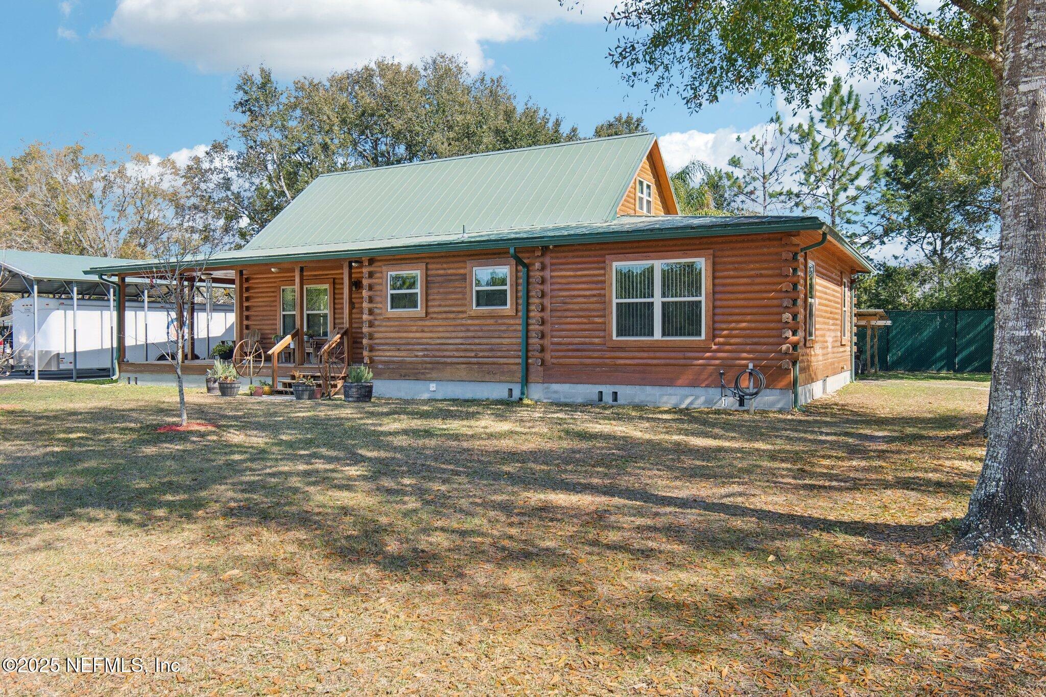 Property Photo:  10819 Russell Sampson Road  FL 32259 