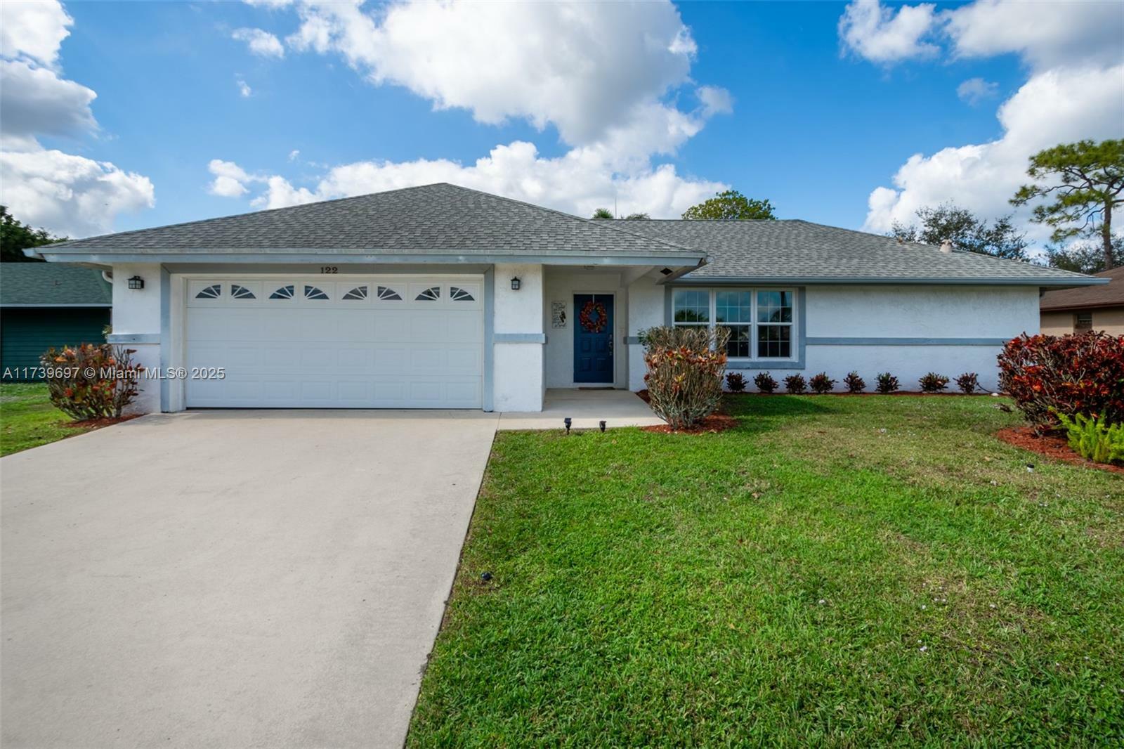 Property Photo:  122 La Mancha Ave  FL 33411 