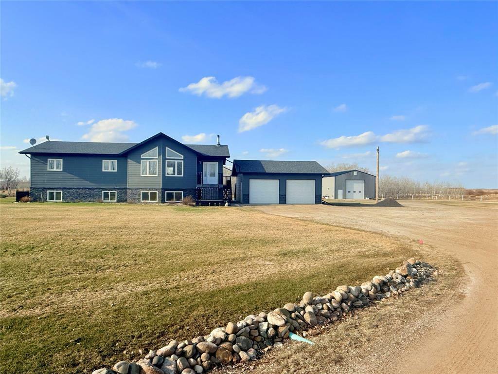 Property Photo: 103165 54 Road North MB R7A 5Y4