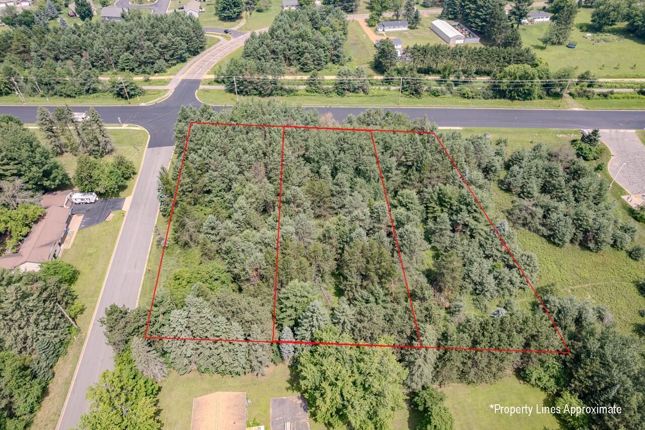 Property Photo: 7403 Schofield Avenue 7407-7411 WI 54476