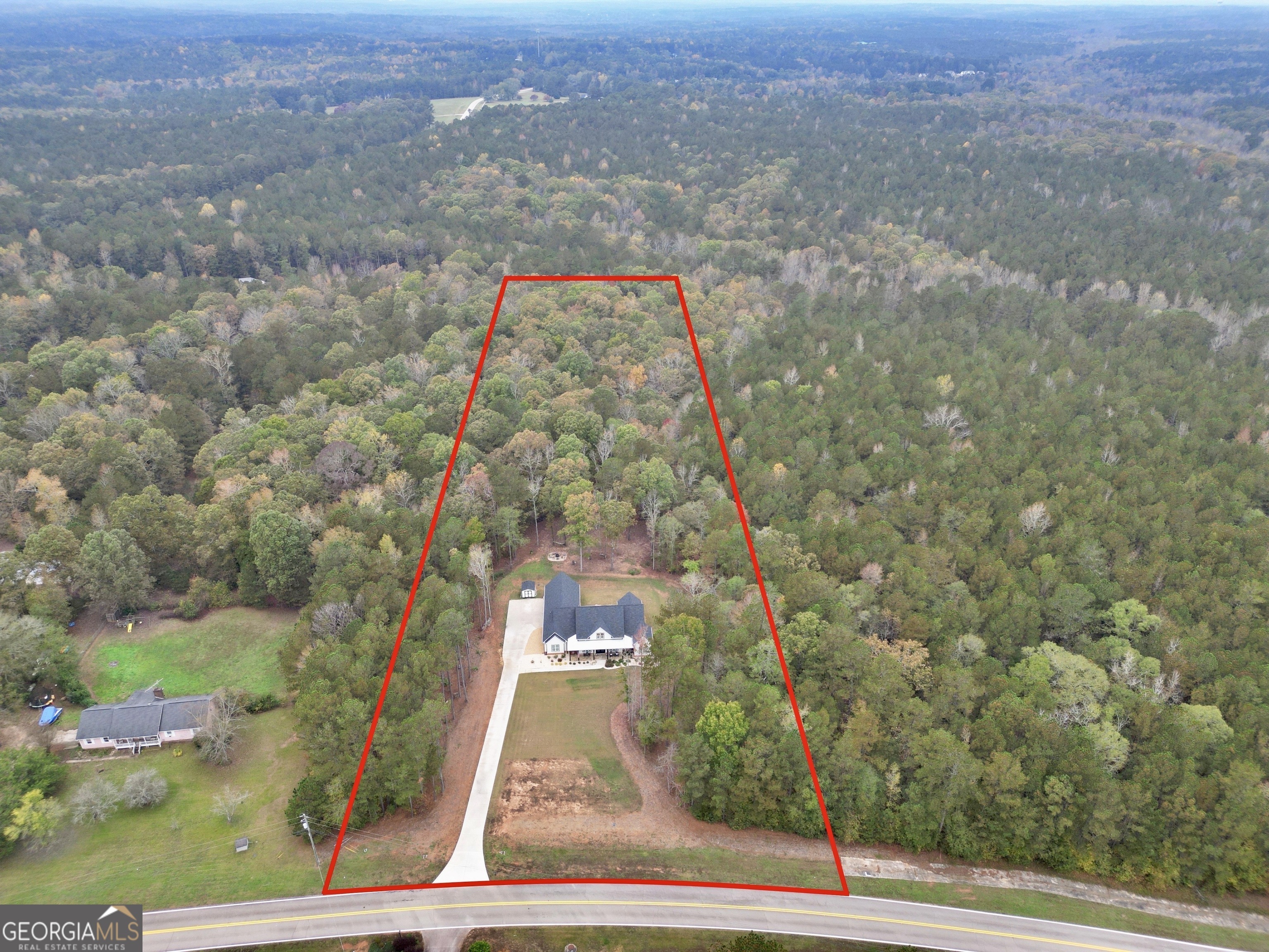 Property Photo:  3911 Peeksville Road  GA 30248 