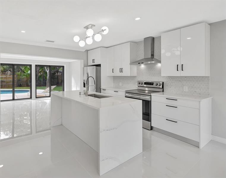 Property Photo: 1310 NE 42nd St FL 33334