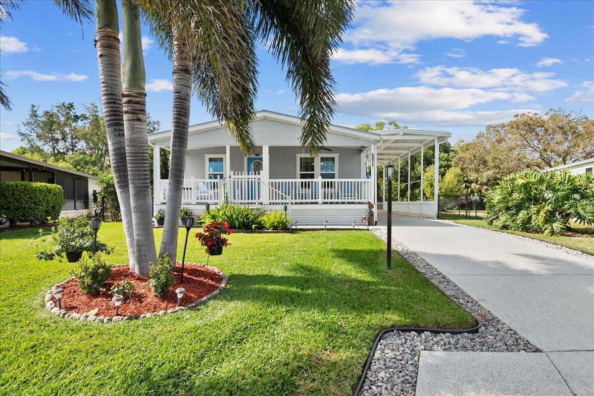 Property Photo: 6877 SE Delegate Street FL 33455