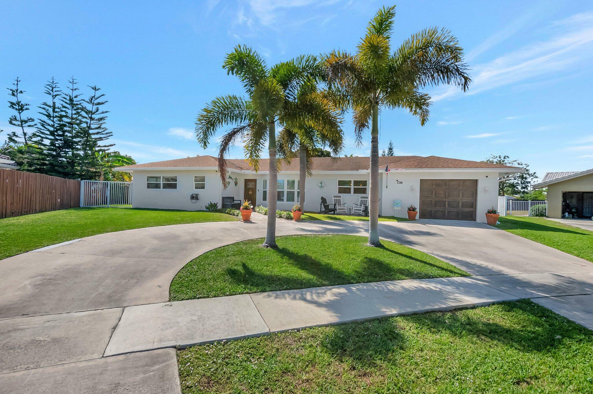 Property Photo:  545 NW 13th Drive  FL 33486 