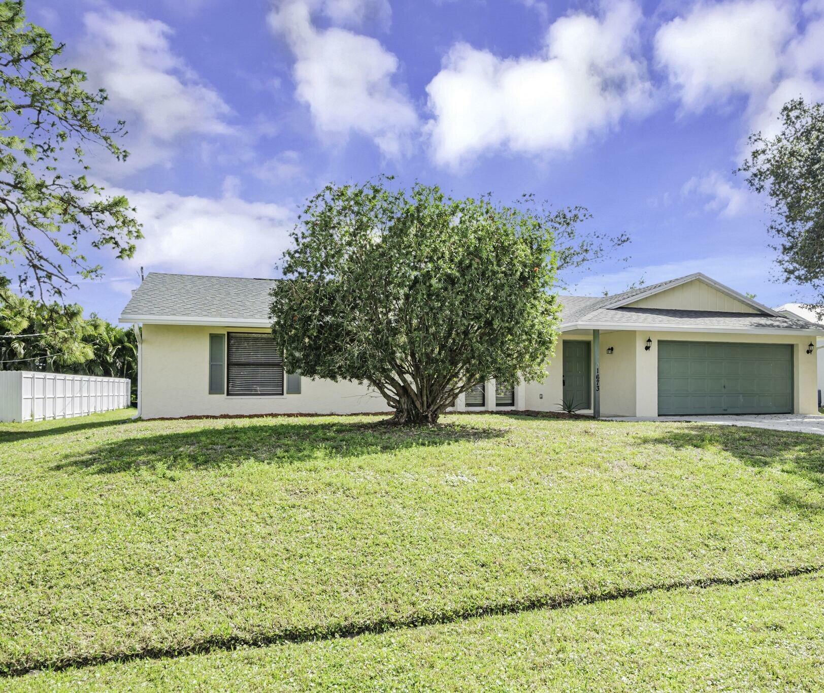 Property Photo:  1673 SE Pleasantview Street  FL 34983 