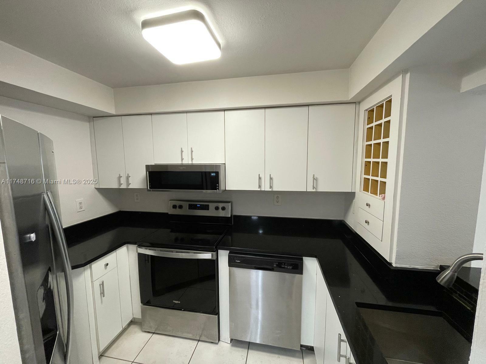 Property Photo:  8275 SW 152nd Ave D-102  FL 33193 